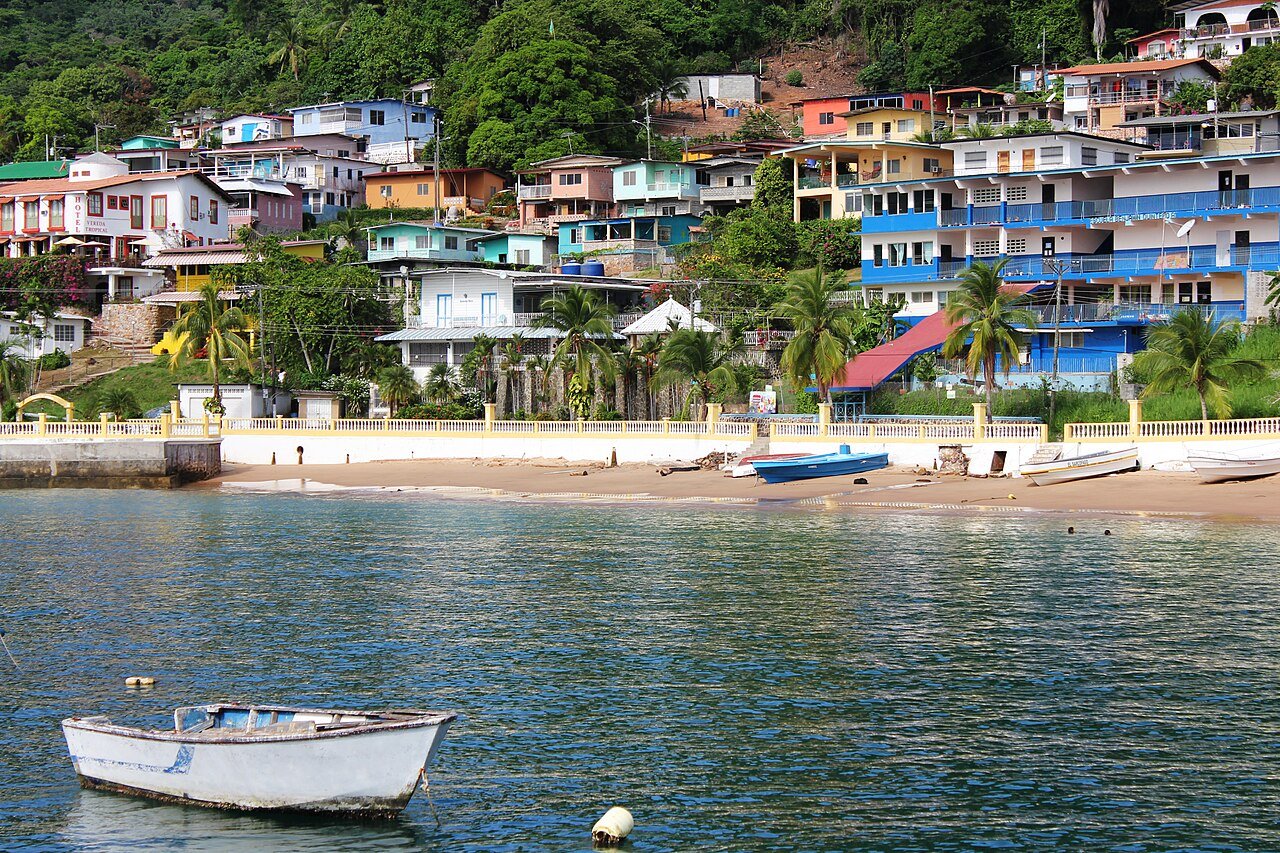 Colorful hillside village of Taboga Island seen from the water